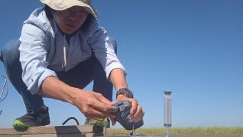photo: researcher gas sampling